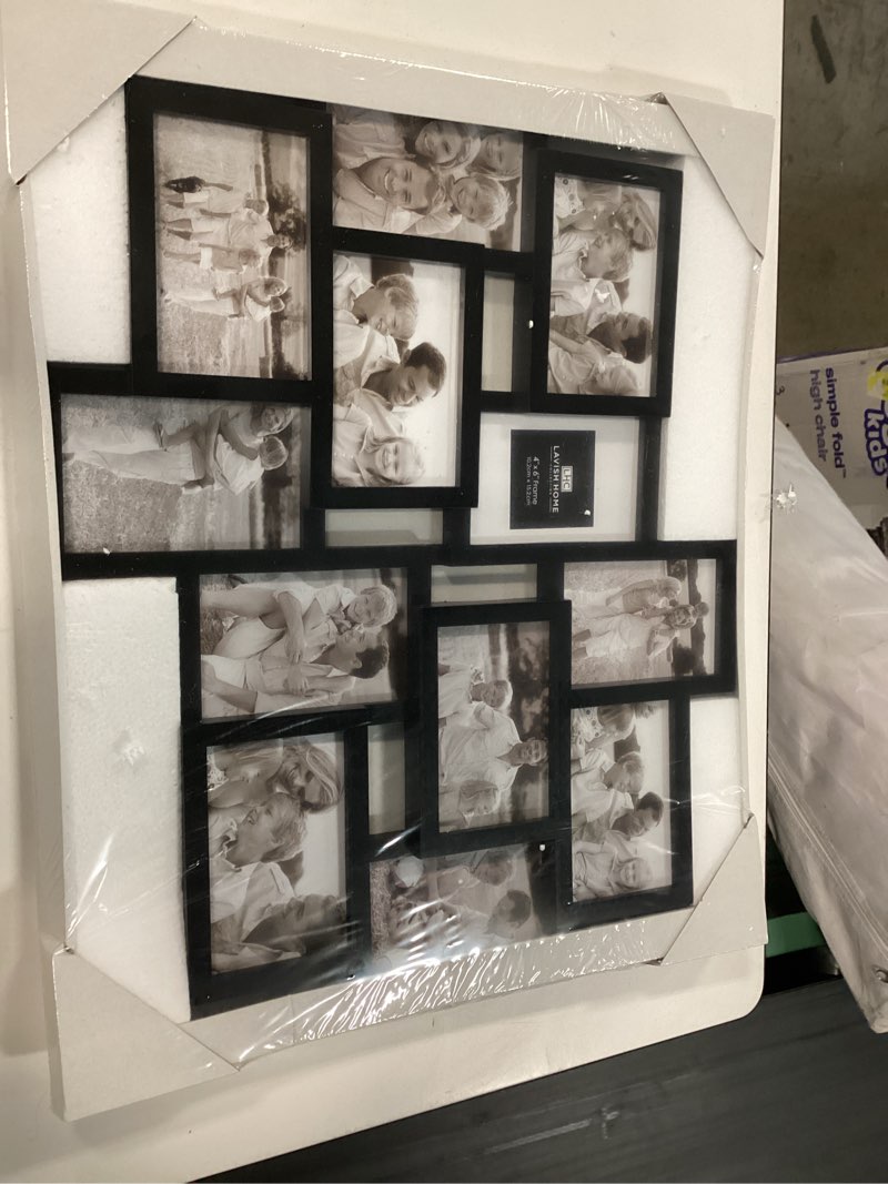 Condition photo showing New/Like New for lavish home photo frame is a multi-opening collage display featuring a black frame design that holds twelve 4x6 photos.