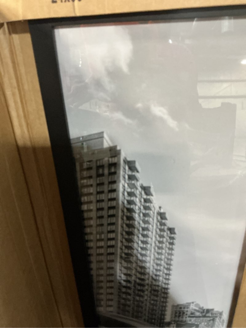Condition photo showing Good Condition for americanflat 24x36 poster frame with polished plexiglass - black picture frame - wide photo frames made of engineered wood for vertical or horizontal wall display - epic collection - black 24x36 black