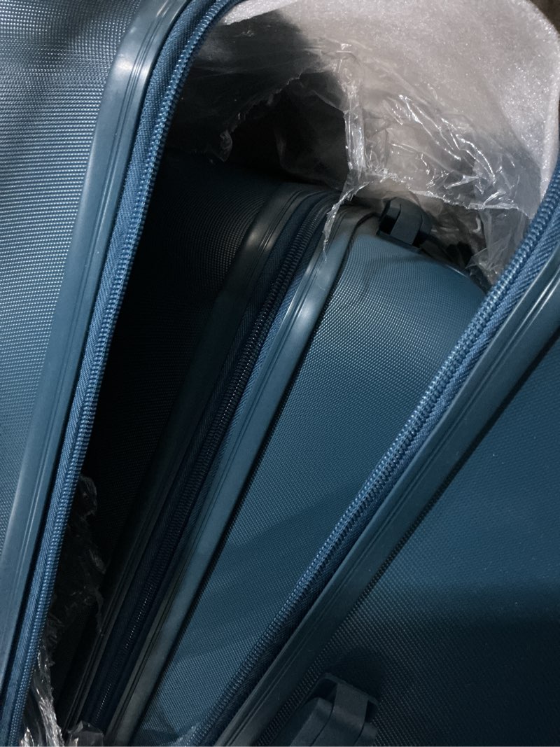 Condition photo showing Good Condition for protege 2-piece hardside spinner luggage set with carry on and medium checked suitcase, blue