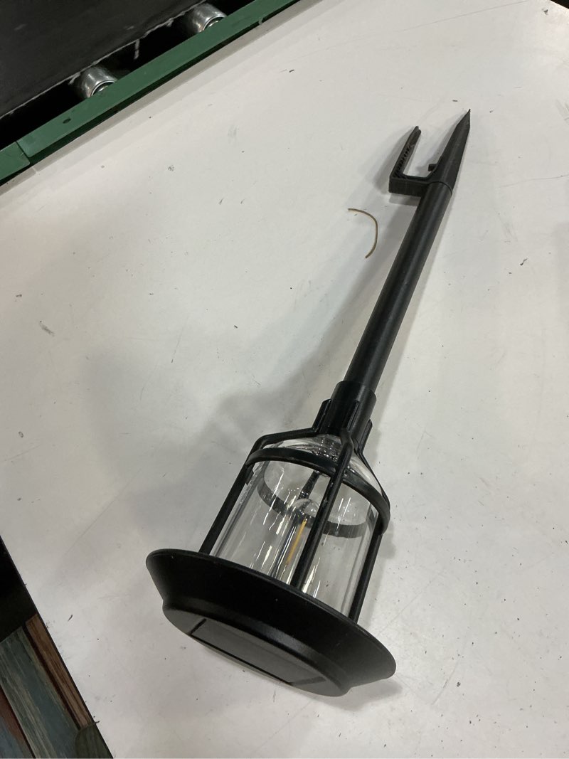 Condition photo showing As Is for solar path light 