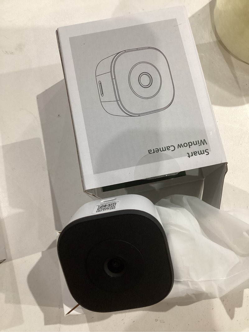 Condition photo showing Good Condition for 2k window camera,2.4g wifi only,smart window security camera with ai motion detection,starlight color night vision,911 emergency support,us cloud storage,24/7 recording,easy & quick install 1 pc