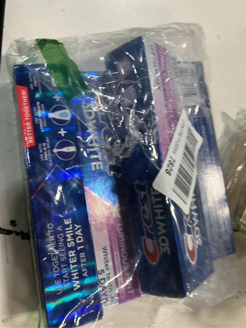 Condition photo showing New/Like New for Crest 3D White Advanced Luminous Mint Teeth Whitening Toothpaste, Crest Toothpaste, 3.7 oz Pack of 4 - Helps Remove Surface Stains, Whitens Teeth, Strengthens Tooth Enamel, Protects Against Cavities Luminous Mint 3.7 Ounce (Pack of 4)