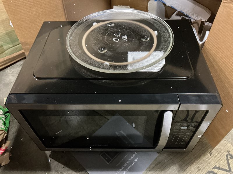 Condition photo showing Good Condition for farberware 1.1 cu. ft. countertop microwave oven – 1000 watts power, auto cook settings, defrost, easy clean and child safety lock - stainless
