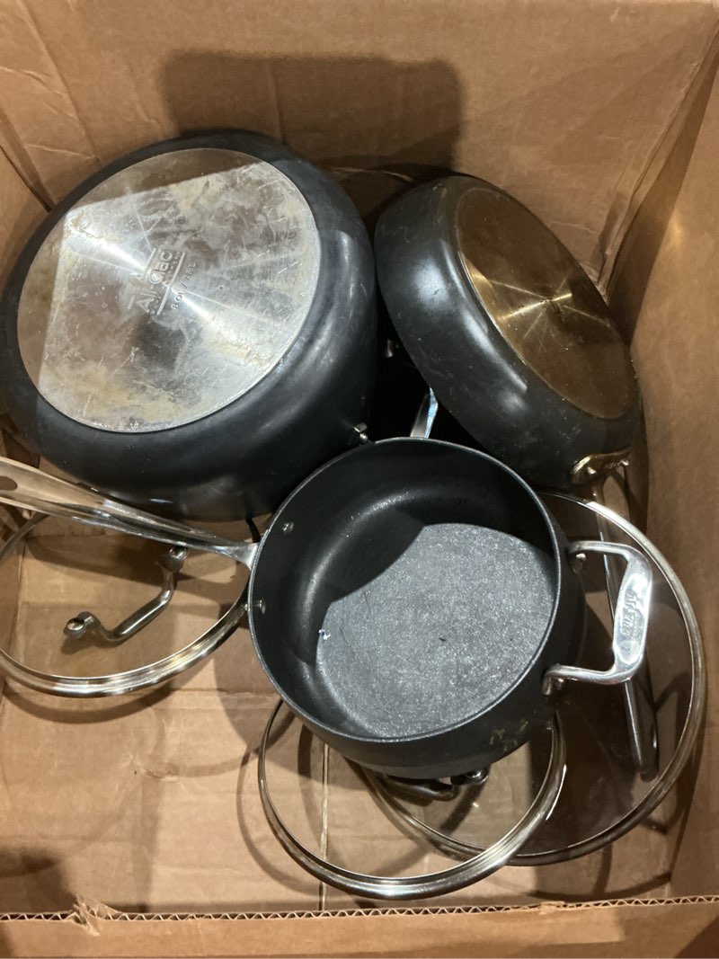 Condition photo showing As Is for (only 2 pots and one skillet)(used)all-clad ha1 expert hard anodized nonstick frying pan set, 2-piece 10\\\\\\\\\\\\\\\" & 12\\\\\\\\\\\\\\\" skillet set, dishwasher-safe, oven-safe up to 500°f compatible with all stovetops (gas, electric & induction) - black 2-piece set (10\\\\\\\\\\\\\\\" + 12\\\\\\\\\\\\\\\")