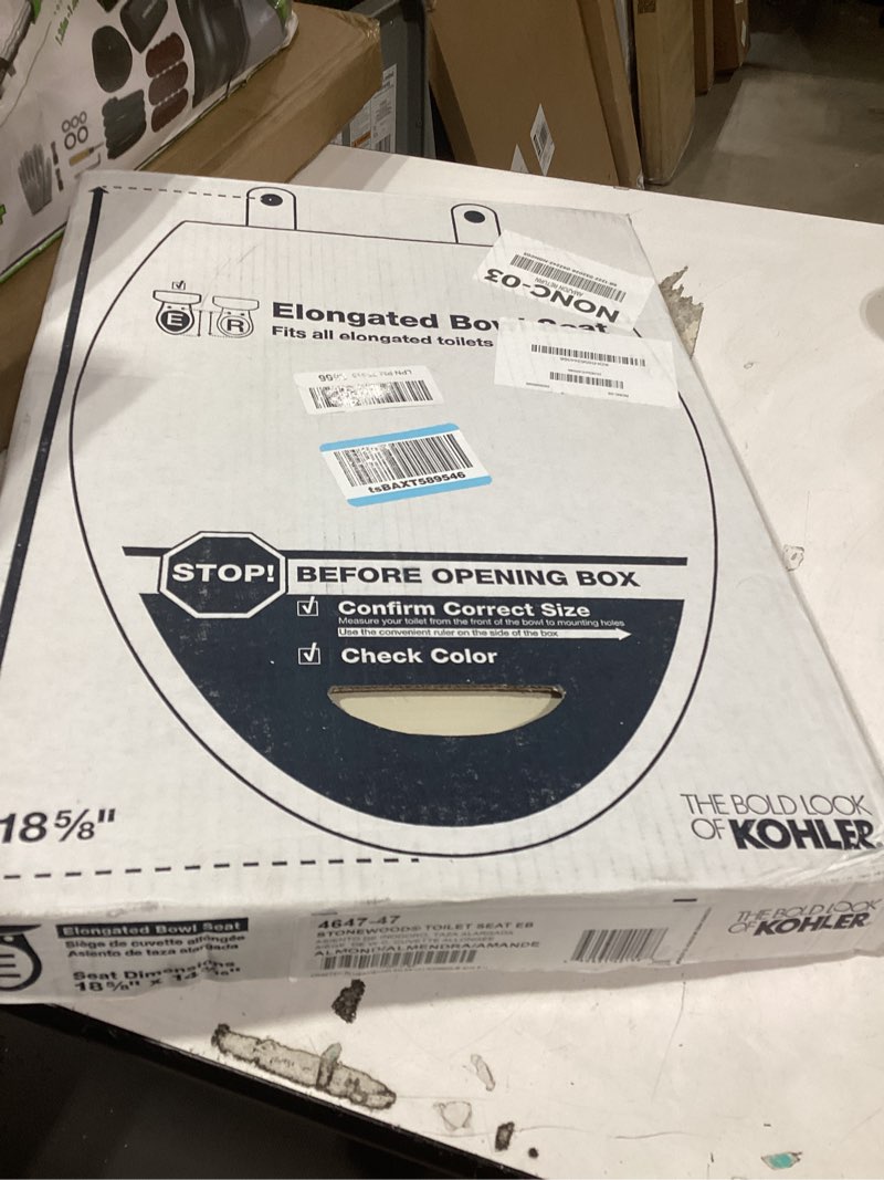 Condition photo showing New/Like New for kohler k-4647-47 stonewood molded-wood with color-matched plastic hinges elongated toilet seat, almond almond elongated