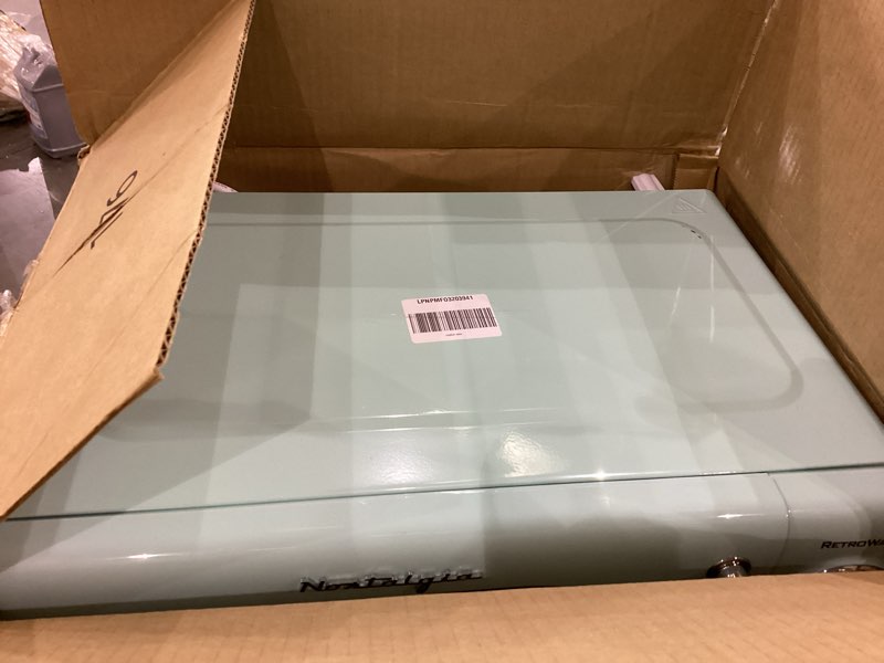 Condition photo showing As Is for Nostalgia Retro Compact Countertop Microwave Oven, 0.7 Cu. Ft. 700-Watts with LED Digital Display, Child Lock, Easy Clean Interior, Aqua Retro Classic 0.7 Cu. Ft. Aqua