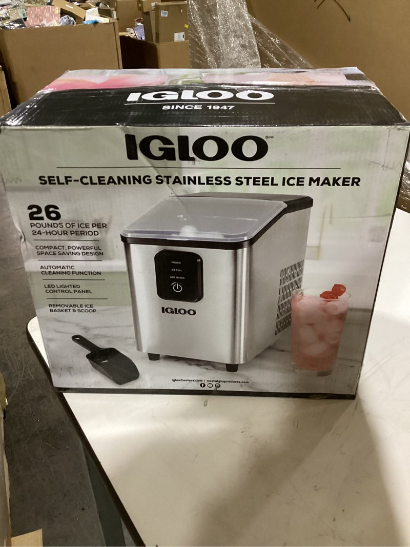 Condition photo showing As Is for Igloo Self-Cleaning Countertop Ice Maker - Compact and Portable - Creates 26 lbs. Per Day, 8 Pieces Ready Every 7-8 Minutes - Includes Ice Scoop and Basket - Black Black 26 Lb