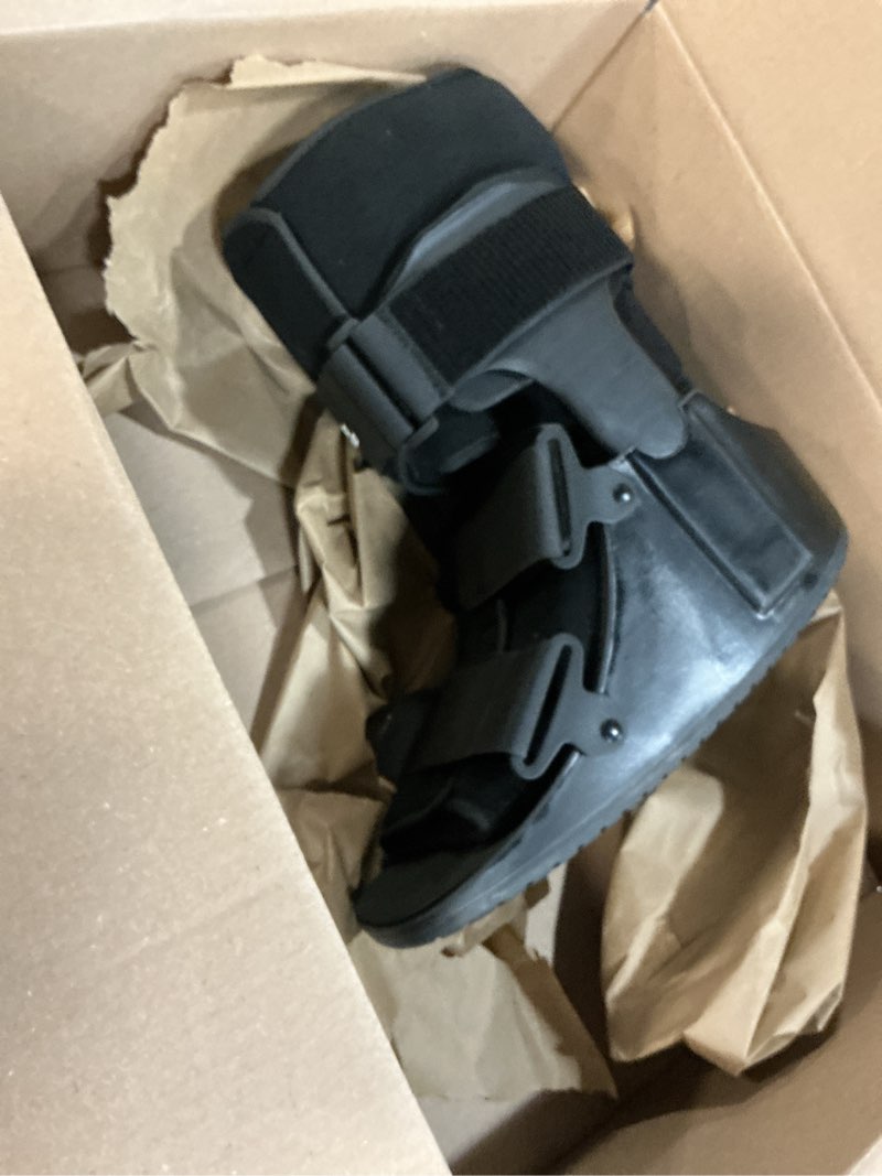 Condition photo showing As Is for united ortho usa14115 short air cam walker fracture boot, medium, black
