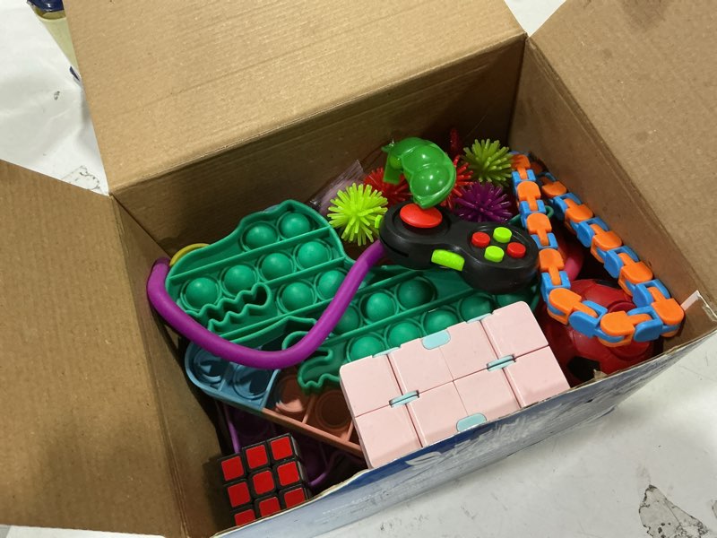 Condition photo showing Good Condition for fidget poppers pack – 50 pcs fidget toys, party favors for kids 8-12, stocking stuffers, bulk sensory toys for classroom treasure box prizes, goodie bags, birthday gifts