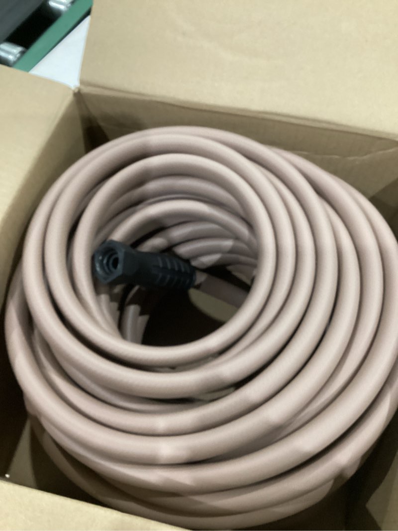 Condition photo showing Good Condition for colors series 5/8 in. x 100 ft., 3/4 in. garden hose with swivelgrip in brown mulch