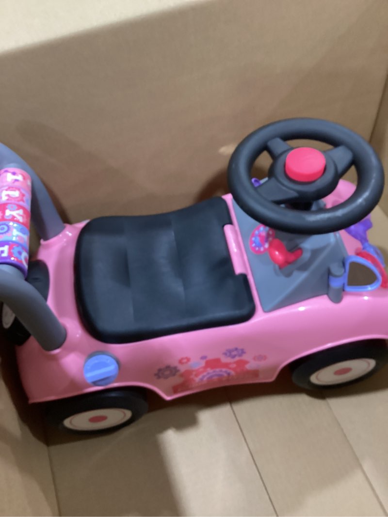 Condition photo showing As Is for Radio Flyer Creativity Car, for Toddlers 1-3, 3-in-1 Push Walker Ride On Rocket with 17 Sensory Activities, Anti-Tip Feature, Under-Seat Storage, Horn and Gears, 42 lb Capacity, Toddler Ride On Toys Pink