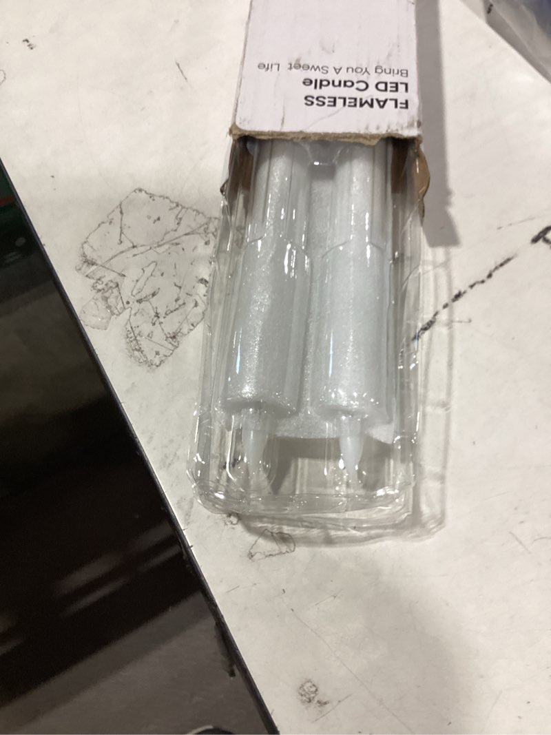 Condition photo showing New/Like New for homemory 2 pcs white flameless taper candles with remote and timer, real wax made 9.6" battery operated candle stick flickering, led taper candles with lifelike flame for indoor home decor