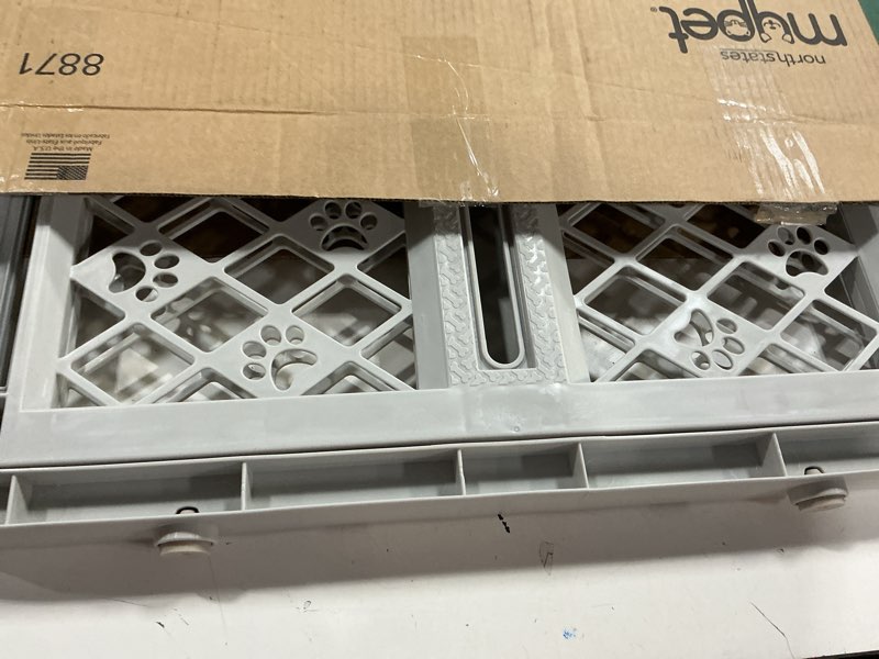 Condition photo showing As Is for MYPET North States Paws Portable Pet Gate: 26-40" Wide. Pressure Mount. No Tools Needed. Made in USA. Dog Gate 23" Tall, Expandable, Durable Dog Gates for Doorways, Light Gray
