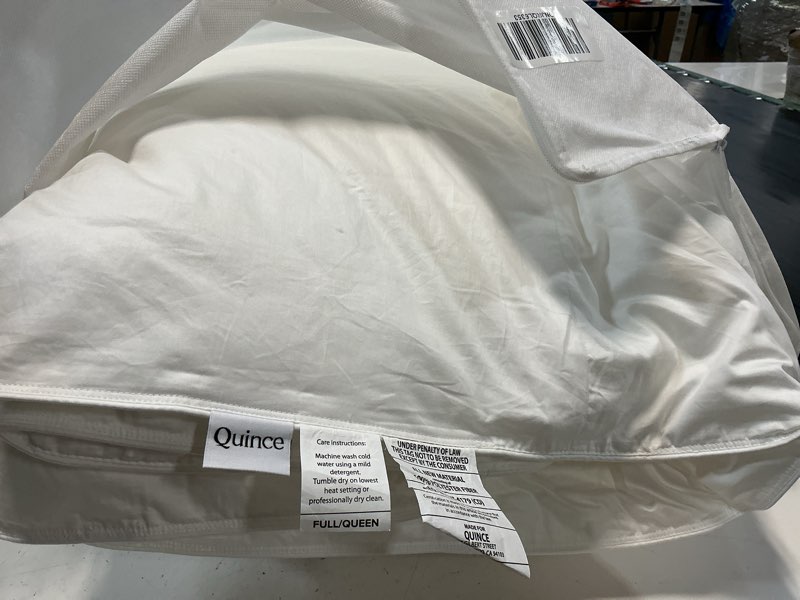 Condition photo showing As Is for quince premium down alternative comforter full/queen all season