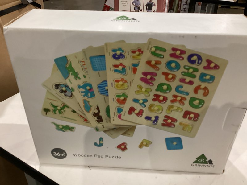 Condition photo showing New/Like New for wooden peg puzzles