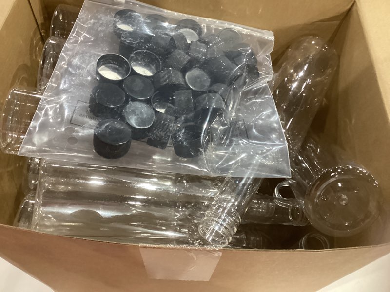 Condition photo showing Good Condition for Tioncy 30 Pcs 15 oz Plastic Long Neck Coquito Bottle Empty Clear Liquor Wine Bottles with Screw on Caps Homemade Wine Coquito Limoncello Containers for Drinks DIY Christmas Craft Decoration