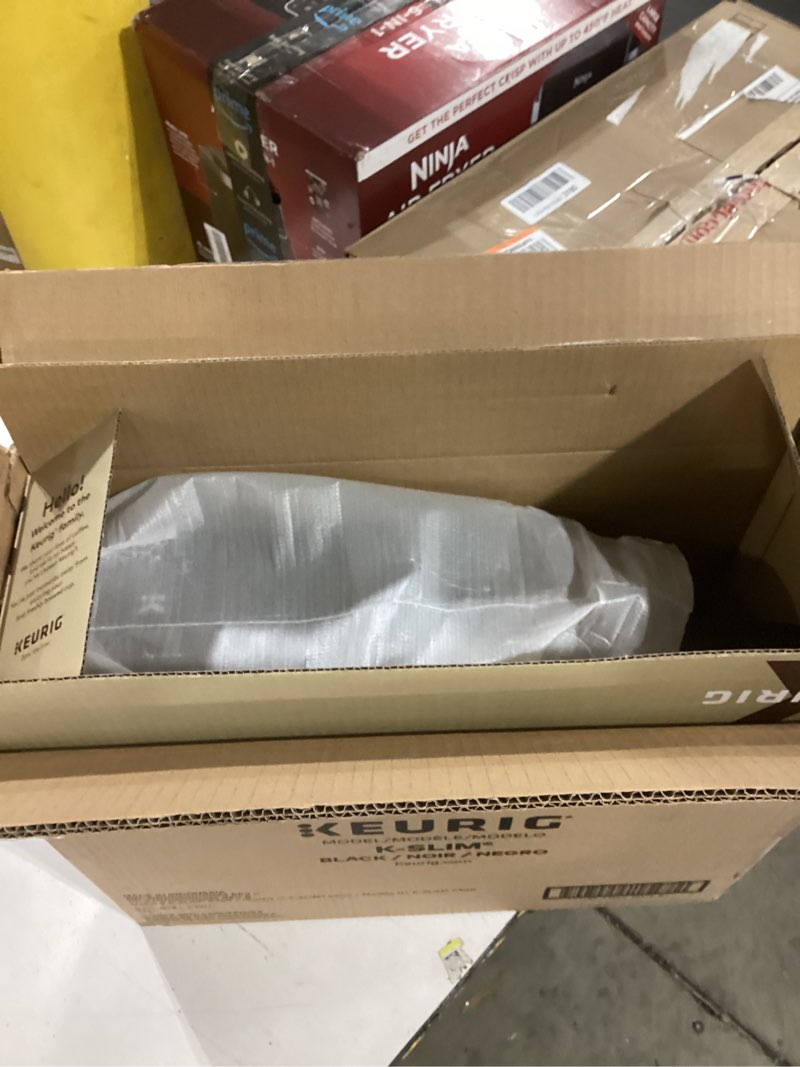 Condition photo showing As Is for Keurig K-Slim Single Serve K-Cup Pod Coffee Maker, Multistream Technology, 3 Brew Sizes, Slim and Sleek Design, 46oz Removable Reservoir, Black