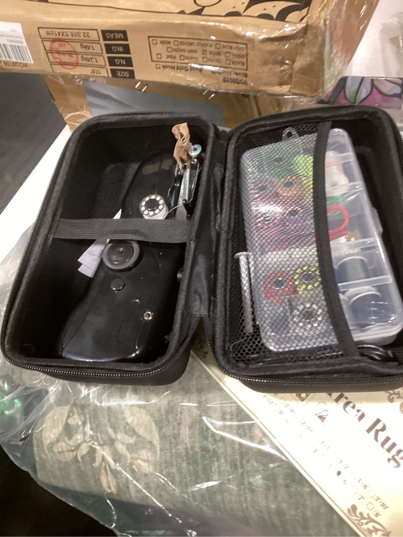 Condition photo showing As Is for beginner's sewing kit with storage handheld sewing machine, portable sewing machine with storage, electric switch, two speed modes,easy to operate.sewing machine for beginners.black with accessories.