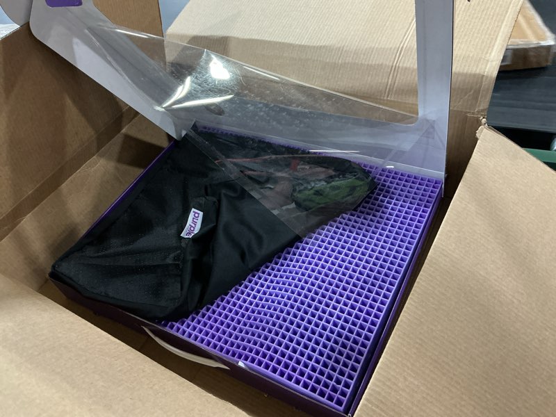 Condition photo showing New/Like New for purple ultimate seat cushion | pressure reducing grid designed for ultimate comfort | designed for gaming | made in the usa