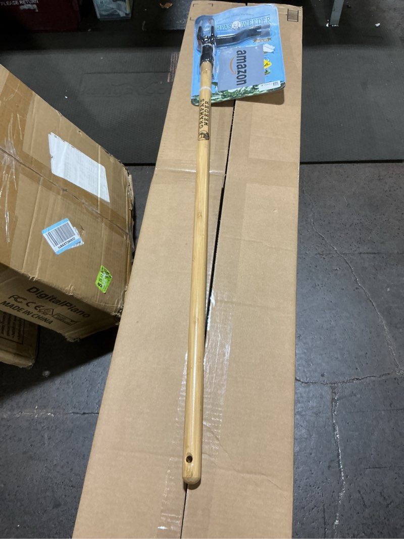 Condition photo showing New/Like New for grampa's weeder - the original stand up weed puller tool with long handle - made with real bamboo & 4-claw steel head design - easily remove weeds without bending, pulling, or kneeling.