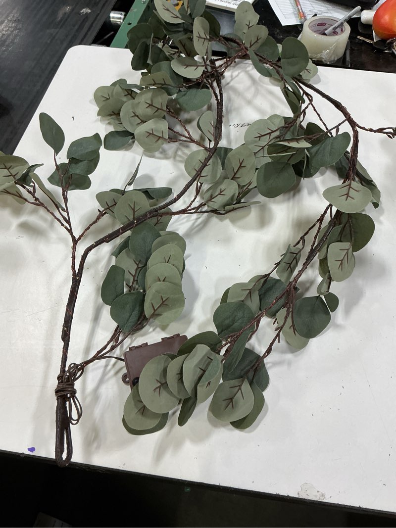 Condition photo showing As Is for hairui lighted artificial eucalyptus garland 6ft 96 led battery operated faux vine lights with timer for spring wedding backdrop wall decor