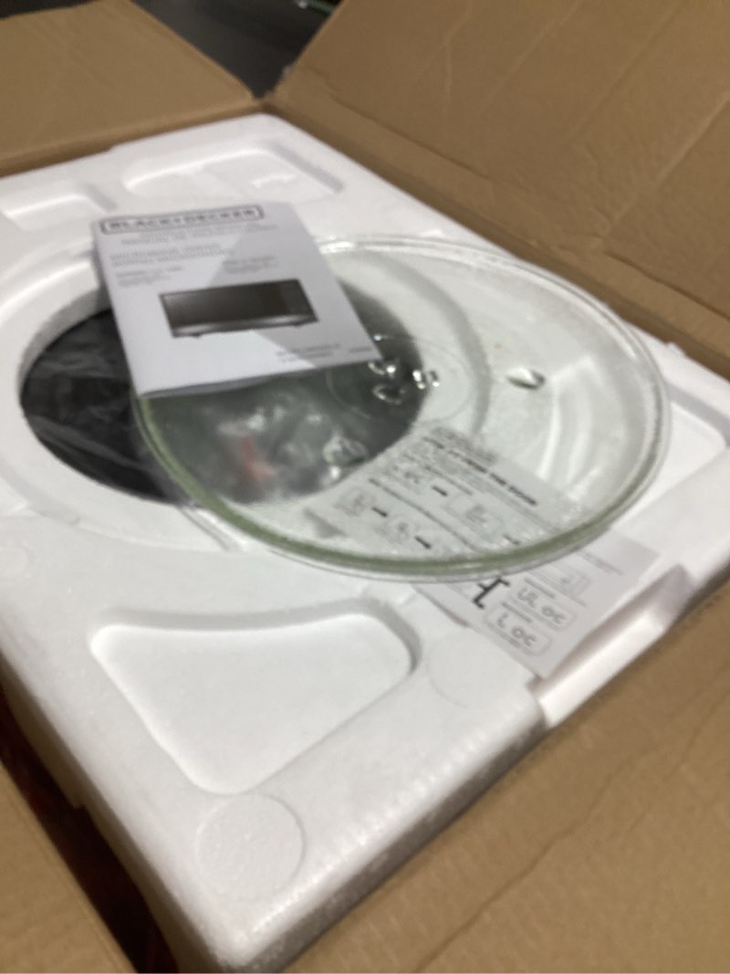 Condition photo showing New/Like New for BLACK+DECKER EM031MB11 Digital Microwave Oven with Turntable Push-Button Door, Child Safety Lock, 1000W, 1.1cu.ft, Black & Stainless Steel, 1.1 Cu.ft
