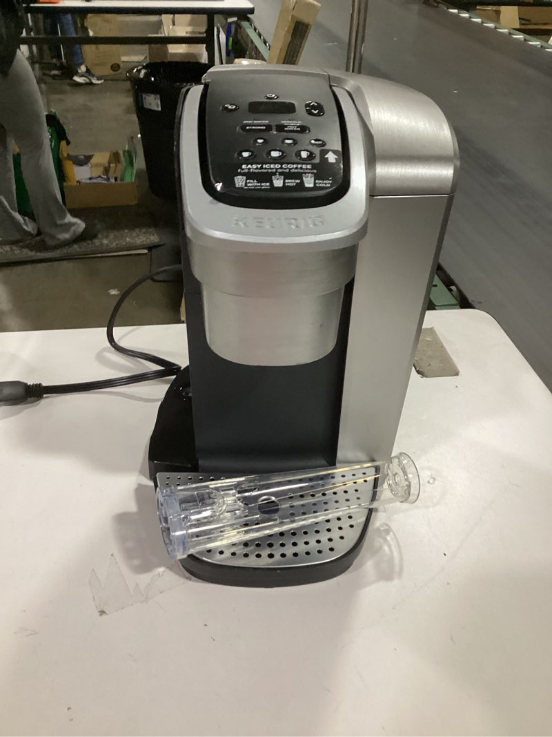 Condition photo showing As Is for ** incomplete** **missing water tank** keurig k-elite single serve k-cup pod coffee maker, with strength and temperature control, iced coffee capability, 8 to 12oz brew size, programmable, brushed silver
