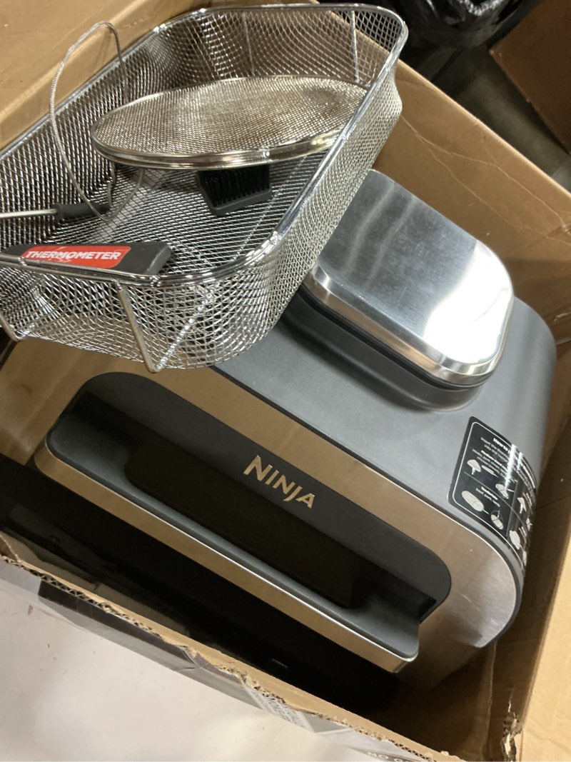 Condition photo showing As Is for ninja dg551 foodi smart xl 6-in-1 indoor grill with air fry, roast, bake, broil, & dehydrate, foodi smart thermometer, 2nd generation, black/silver 6-in-1 with thermometer