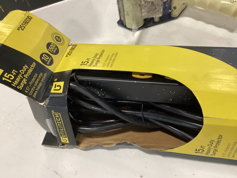 Condition photo showing As Is for Utilitech 15-ft 10 -Outlet Indoor Black Power Strip Item #2516030 | Model #LTS-10T-1