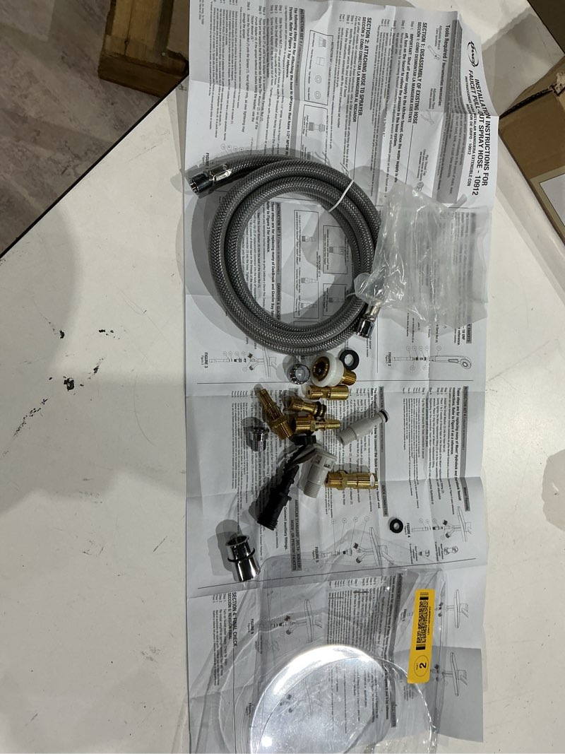 Condition photo showing As Is for faucet pull-out spray hose