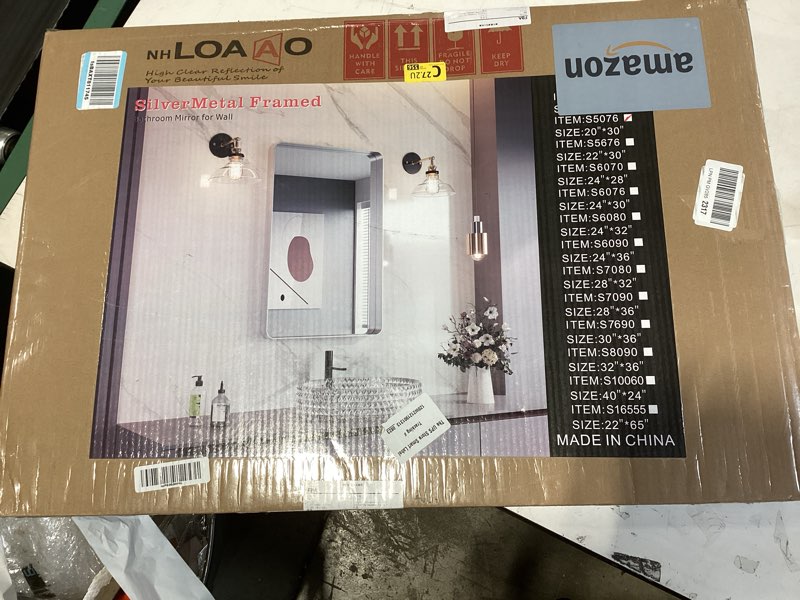 Condition photo showing Good Condition for loaao 20x30 inch brushed nickel bathroom mirror, rounded rectangle silver metal frame mirror, brushed nickel, anti-rust, shatter proof, hangs horizontally or vertically brushed nickel 20"l x 30"w