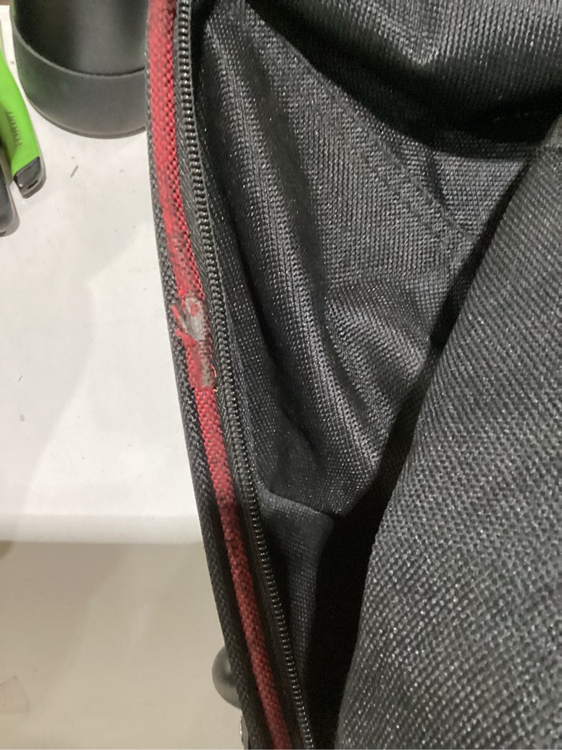 Condition photo showing As Is for 32in expandable rolling duffle