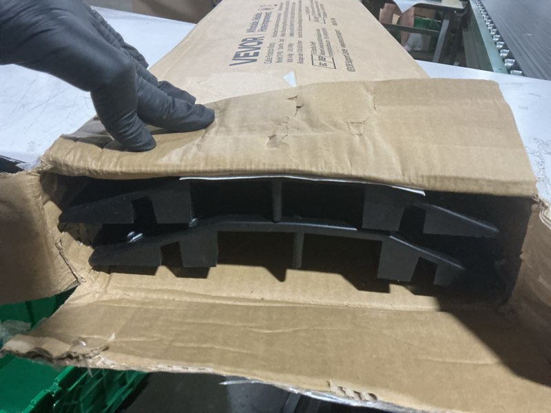 Condition photo showing Good Condition for 3.2 ft. cord protecting speedbump, 17500 lbs. capacity heavy duty drop over cable cover for indoor high traffic