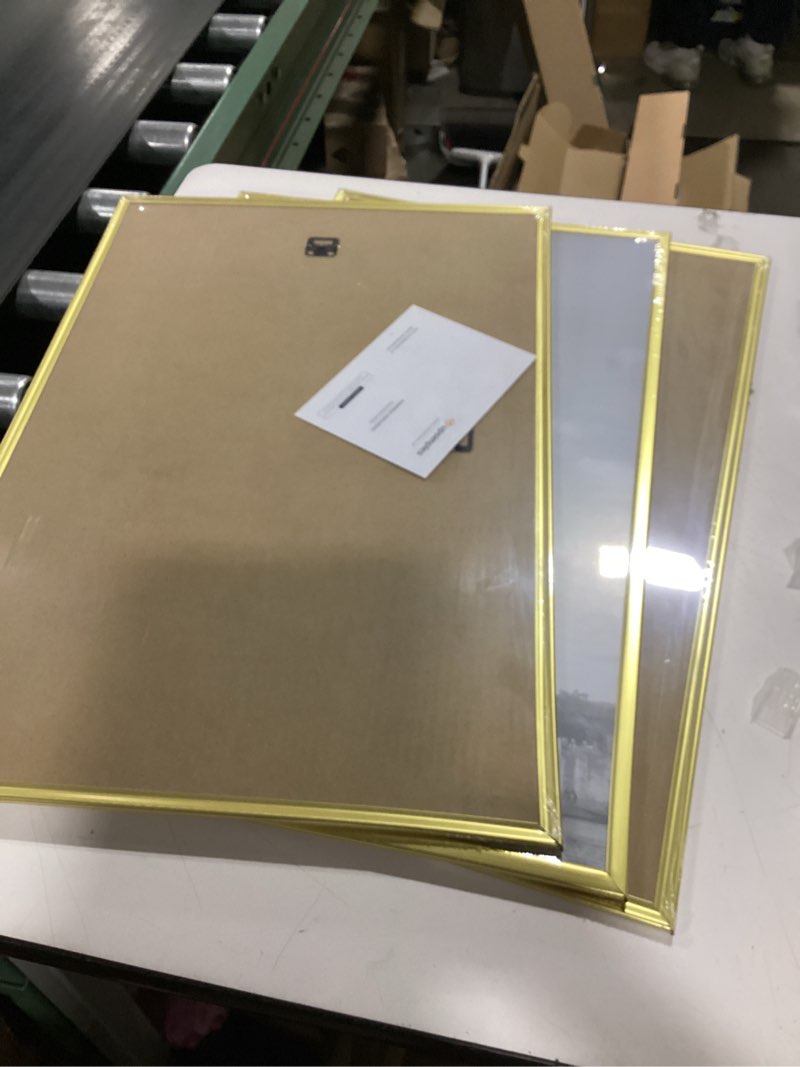 Condition photo showing New/Like New for upsimples 16x24 picture frame gold 3 pack, scratch-proof poster frames 16 x 24 for photo gallery - slide-in strips, horizontal or vertical wall mounting gold 16x24