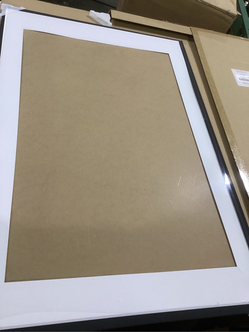 Condition photo showing As Is for upsimples 24x36 Poster Frame, Display Pictures 20x30 with Mat or 24 x 36 Without, Wall Hanging Picture Frames, Black, 1 Pack Black 24x36