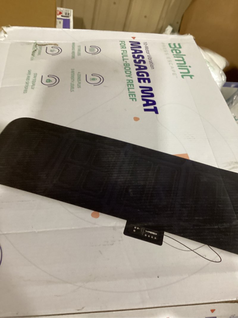 Condition photo showing New/Like New for belmint neck back massage mat