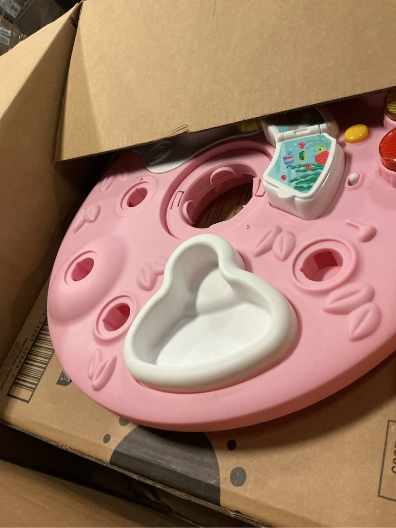 Condition photo showing As Is for bright starts around we go 2-in-1 baby walker, discovery activity center and table, tropic coral, ages 6 months+ tropical coral activity center & table