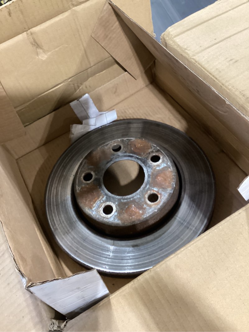 Condition photo showing As Is for front brake rotors kit for 2007-2017 jeep wrangler, 2018 jeep wrangler jk drilled and slotted e-coating vented brake rotors and ceramic brakes pads front brake rotors & pads