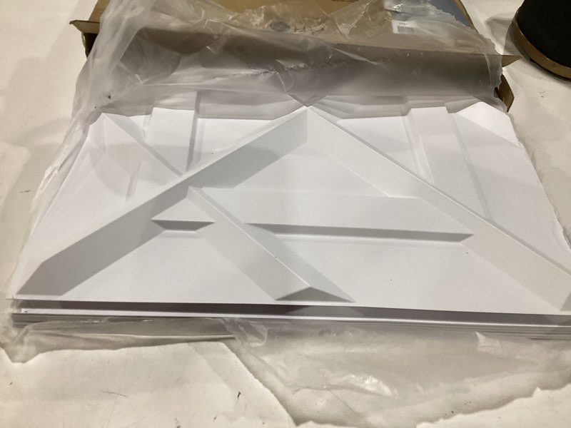 Condition photo showing Good Condition for art3d pvc 3d wall panel, decorative wall tile in white 12-pack 19.7"x19.7" matt white