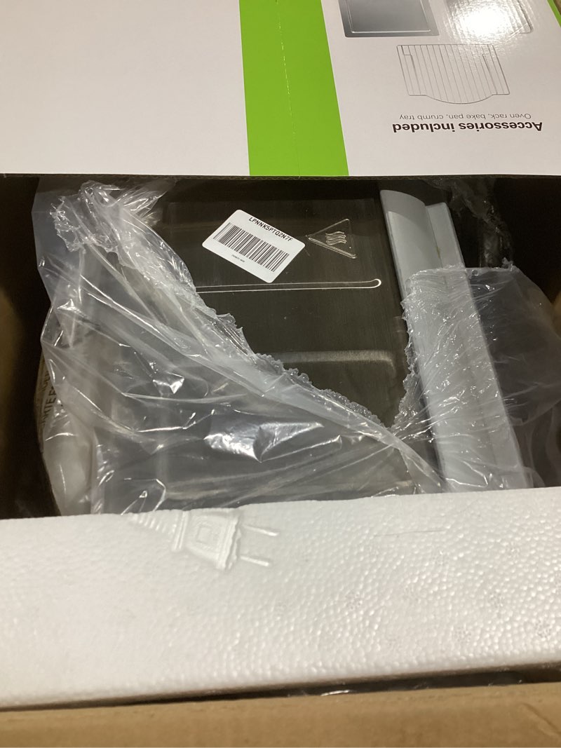 Condition photo showing As Is for Hamilton Beach 6 Slice Countertop Toaster Oven With Easy Reach Roll-Top Door, Bake, Broil & Toast Functions, Auto Shutoff, Silver (31127D)