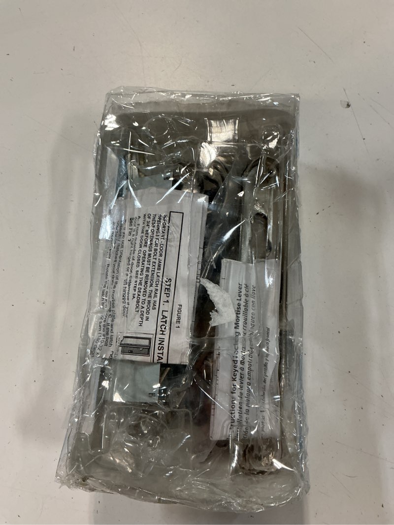 Condition photo showing As Is for serenade mortise keyed lever mount latch with deadbolt for screen and storm doors, satin nickel