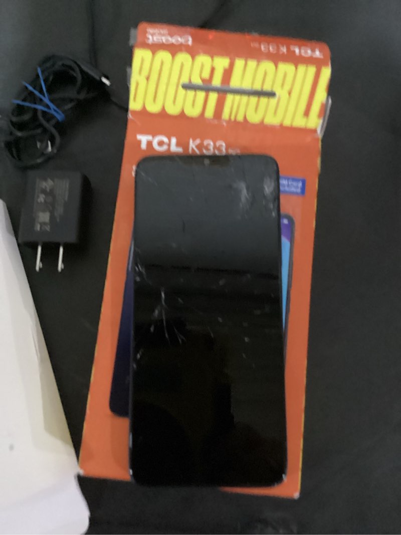 Condition photo showing As Is for screen display damaged boost mobile tcl k33 5g, 64gb, black prepaid smart phone, locked to boost ????
