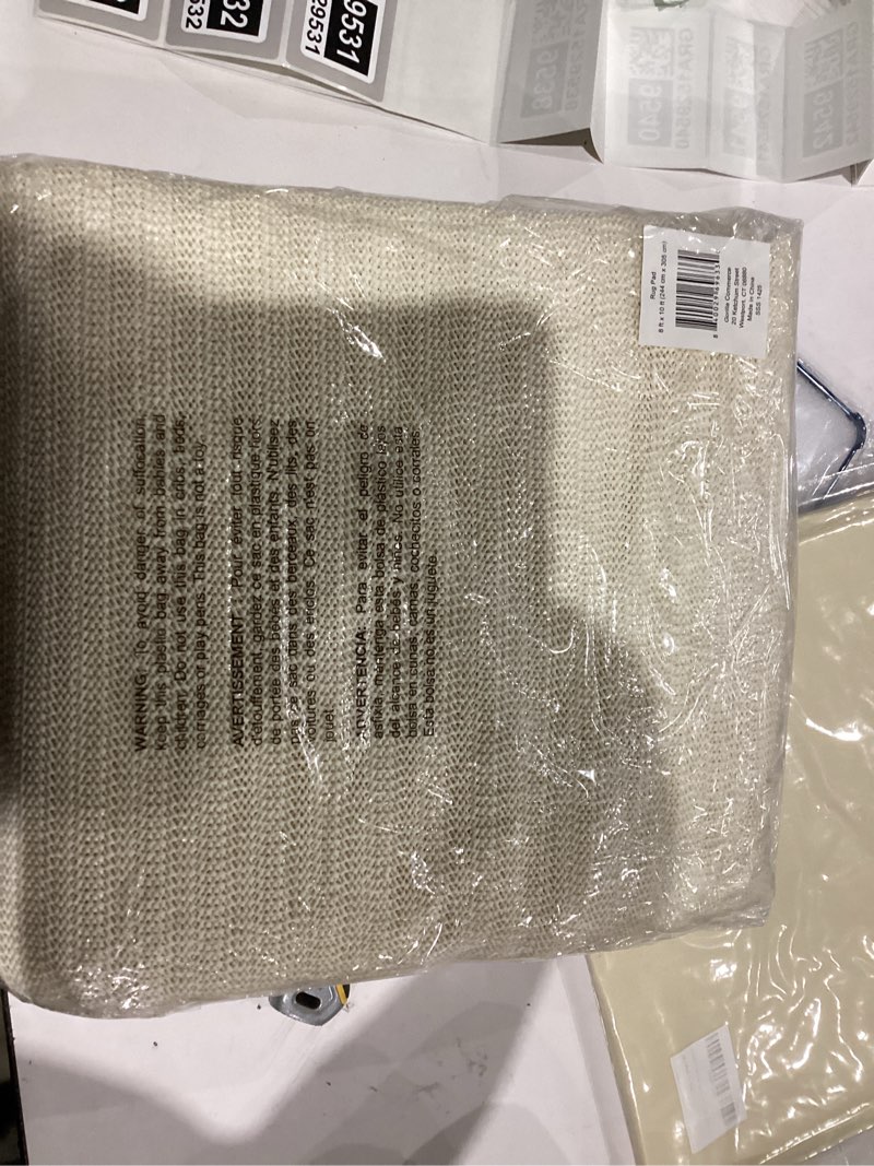 Condition photo showing New/Like New for Ninja Rug Gripper Pad for Hardwood Floors, 8x10 FT, Slip Resistant Grip Pads for Hard Surfaces, Adds Cushion Under Carpet and Maximum Protection, Keeps Area Rugs and Carpets Safe and in Place on Floor 8' x 10' (Rectangular) Traditional Pads for Hard Floors