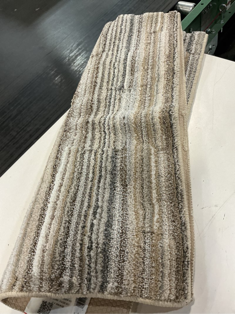 Condition photo showing As Is for mainstays studio plush pixel 22 in. x 60 in. polypropylene indoor runner rug tan/gray