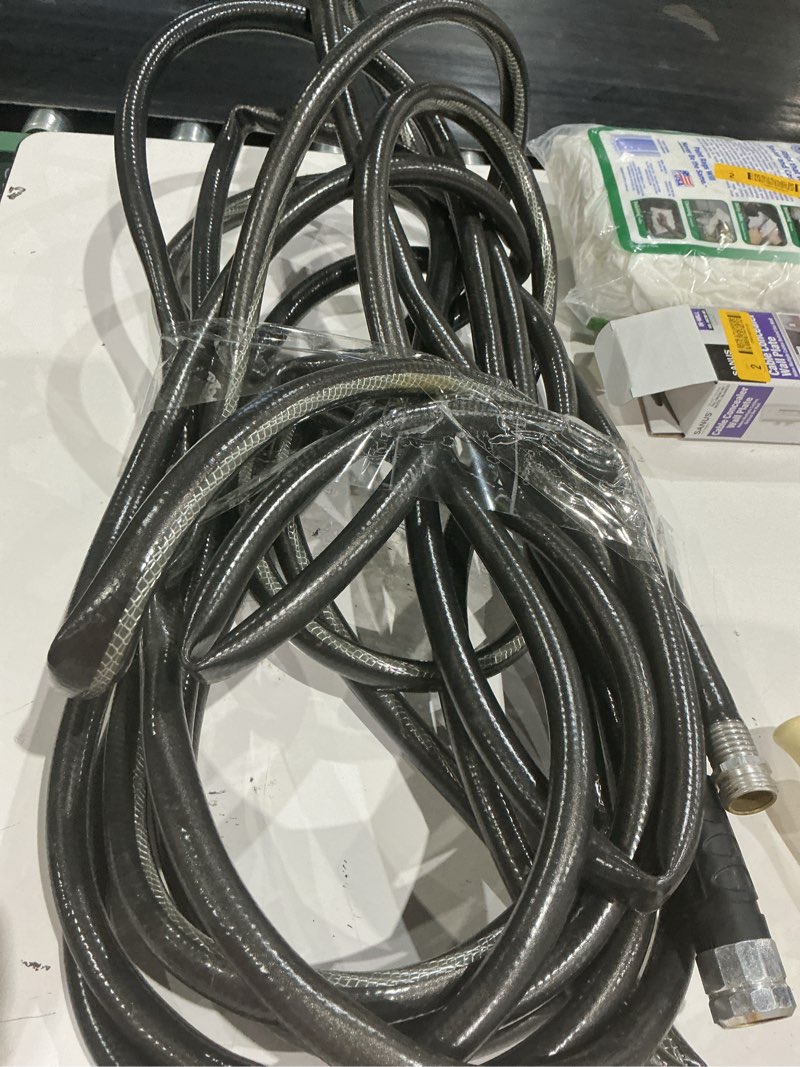 Condition photo showing As Is for teknor apex neverkink vinyl coiled water hose 5/8-in x 25, 50, 75, 100, 125 ft