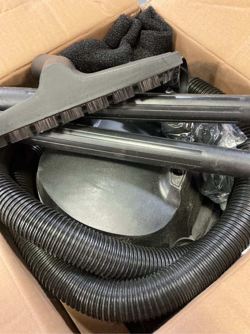 Condition photo showing As Is for amazon basics 4 gallon, 3 hp stainless steel wet/dry vacuum, grey/black
