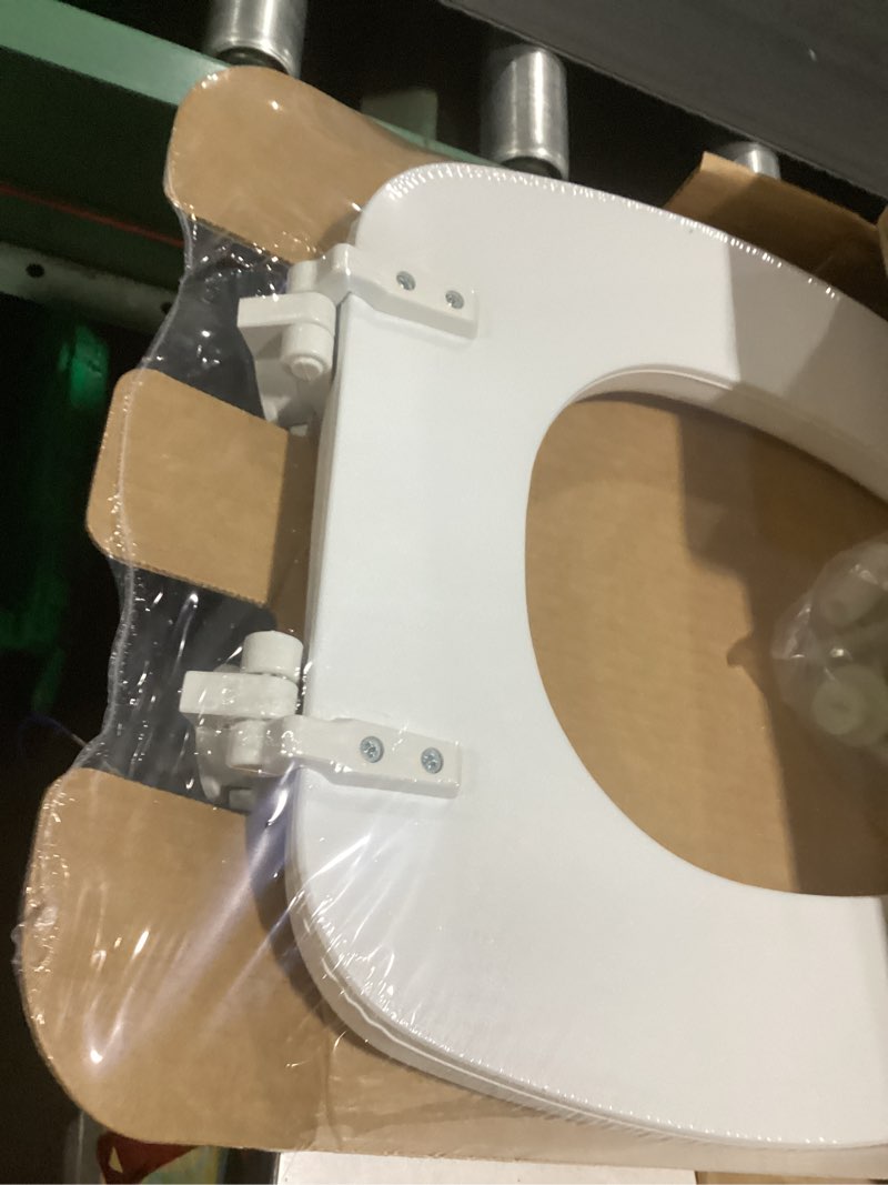 Condition photo showing New/Like New for mayfair padded toilet seat, cushioned soft vinyl over wood core seat, secure hinges, easy clean, made in usa, elongated, white elongated white toilet seat