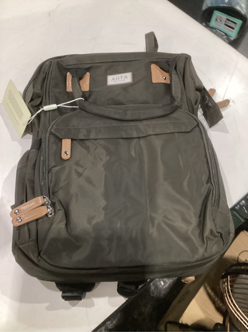 Condition photo showing Good Condition for diaper bag backpack, multifunction diaper bag with changing station, stylish baby bags, large unisex diaper backpack for mom and dad, baby registry search, portable changing pad – black brown