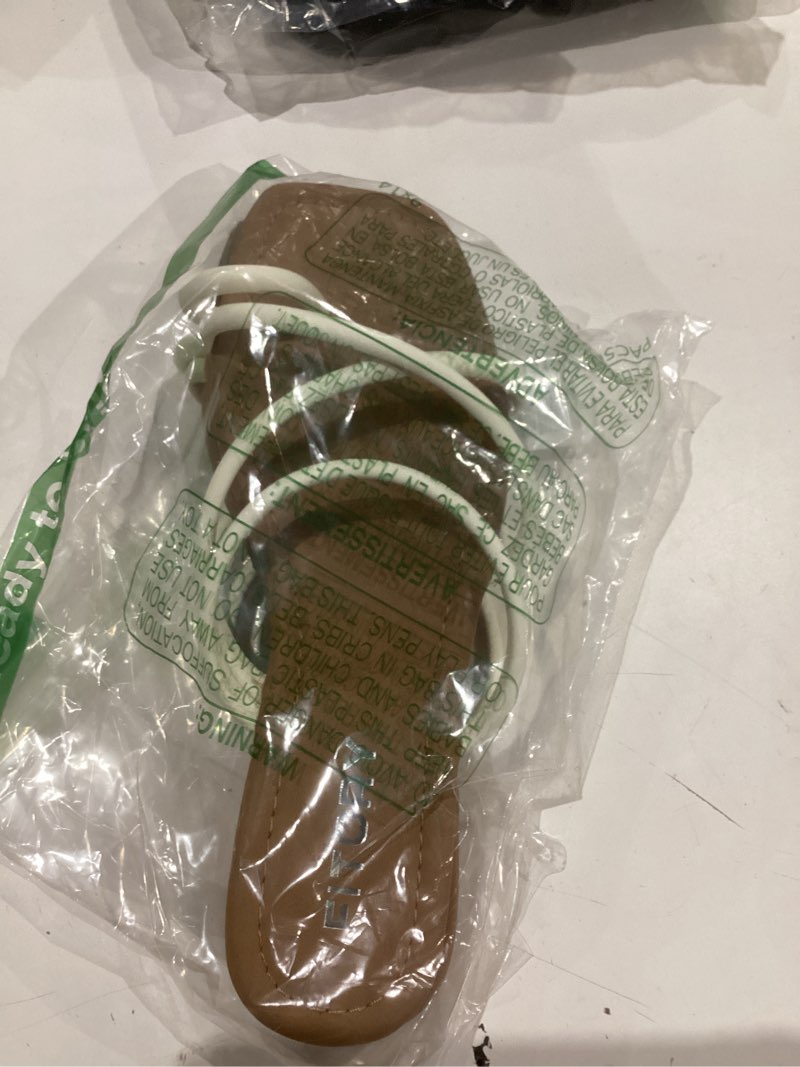 Condition photo showing Good Condition for FITORY Women's Slide Sandals Flat Toe Ring Thongs with Cross Strap for Summer Size 9 White