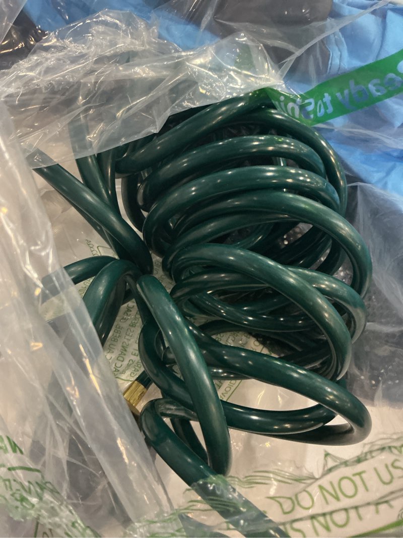 Condition photo showing Good Condition for coil hose 25ft eva coil garden hose with 3/4'' brass connector coiled water hose lightweight and no kink includes 7 patterns spray nozzle for outdoors lawn watering car washing